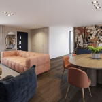 Salon design avec canapé orange, tapisserie à motifs colorés et table ronde en bois avec chaises oranges